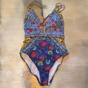 Colorful one-piece with crisscross back detail